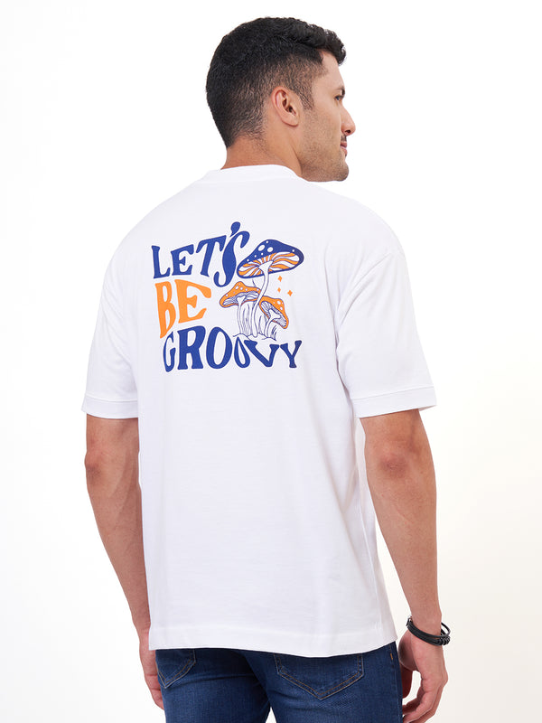 White Graphic Printed T-shirt With Dark Blue Jeans